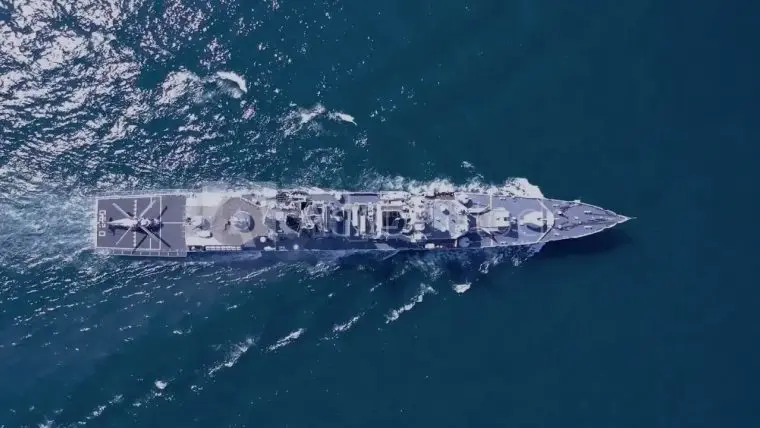 Navy ship underway, seen from above